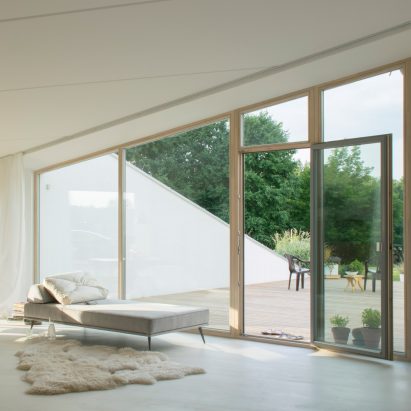Living space and terrace in House and the River by After Party