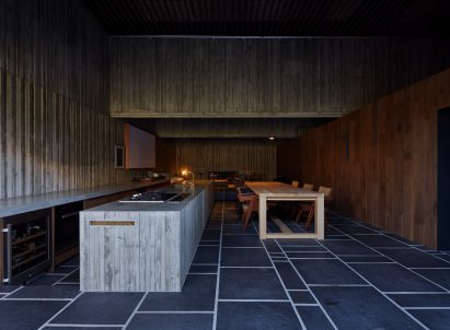 The dark concrete interiors of Japanese kitchen