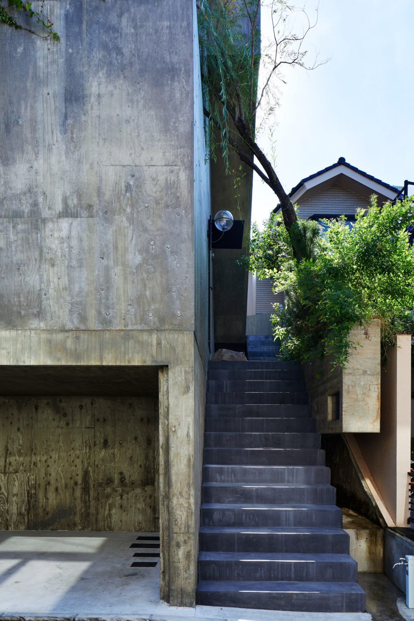 A concrete facade of a Japanese house