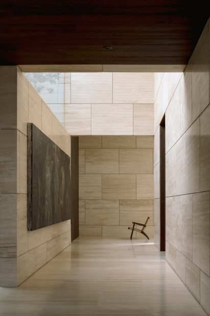 Interior corridor of marble-clad house in Mexico