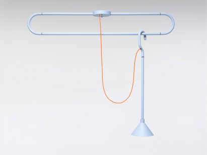 The blue finished lamp has orange wiring