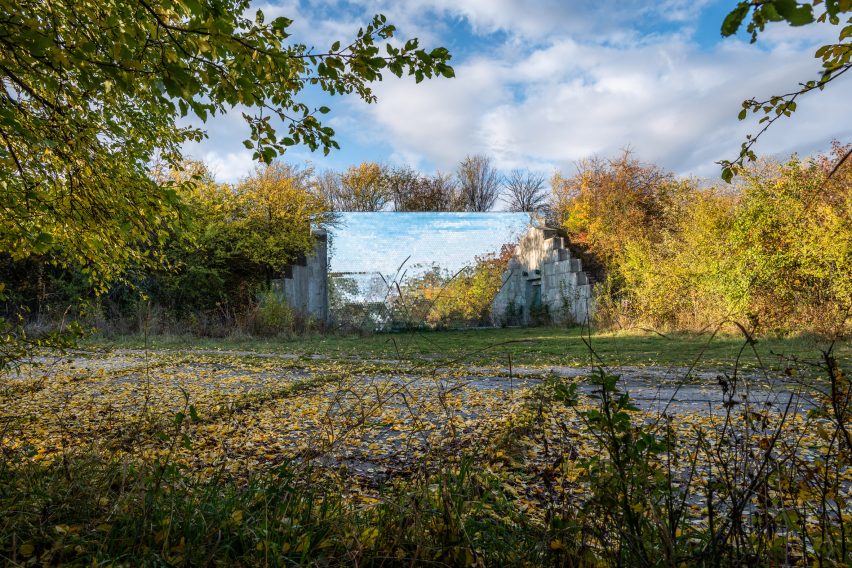 Mirrored pet crematorium at Drnov Air Defense Site by Petr Hájek Architekti