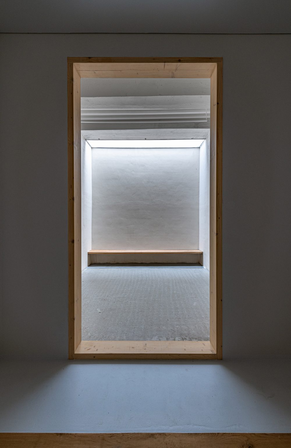 Mirrored pet crematorium at Drnov Air Defense Site by Petr Hájek Architekti