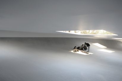 Inside a white-walled student break-out space