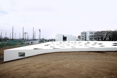 A sheltered plaza embedded in the ground