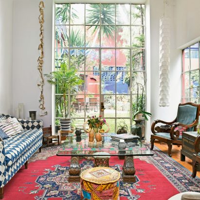 A living room with a floor-to-ceiling window