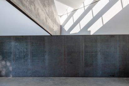 Skylights inside charred-wood pavilion in New York