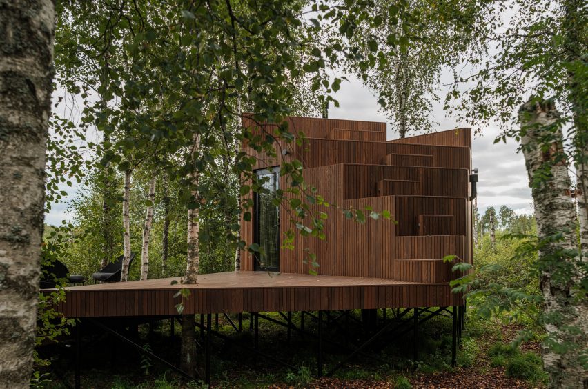 The stepped facade of a wooden holiday cabin