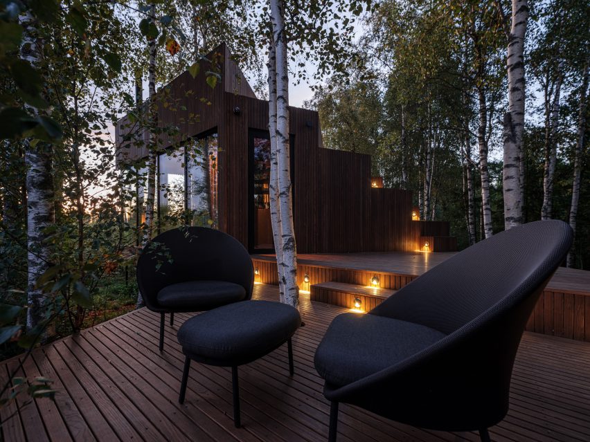 The decking outside a wood-clad cabin