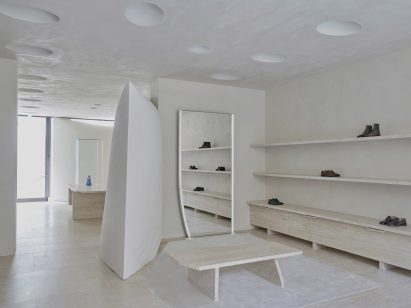 Travertine floors and furniture in Maison Margiela's London Bruton Street store by Studio Anne Holtrop