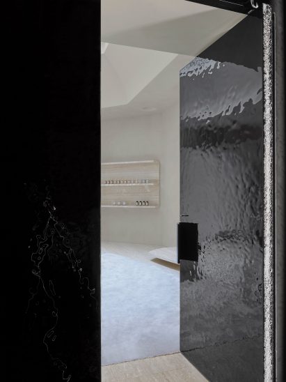 Lacquered changing room doors in Maison Margiela's London Bruton Street store by Studio Anne Holtrop