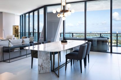 Dining space in One Thousand Museum apartment by Meridiani