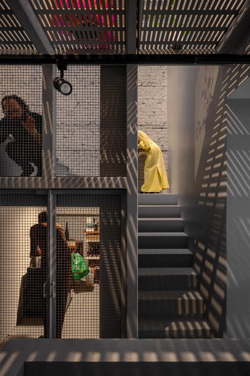 Family inside steel structure in Montreal house