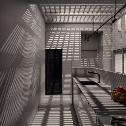 Shadows from steel structure in Montreal kitchen
