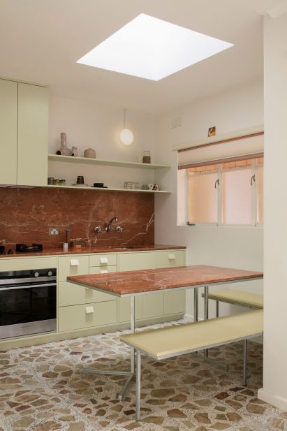 Kitchen with terrazzo floor and skylight