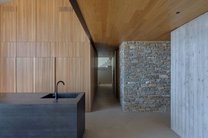 Timber lined kitchen by Mold Architects