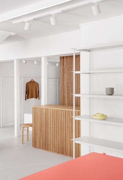 Wooden counter and in the minimalist OCE Copenhagen store interior