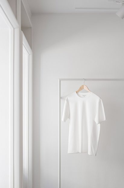 White walls and rails in the OCE Copenhagen store interior by Aspekt Office