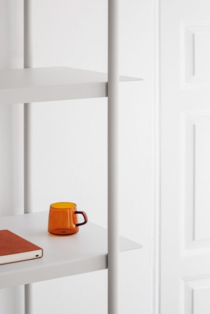 White walls and shelving in the OCE Copenhagen store interior by Aspekt Office
