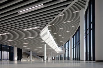 A white foyer in a factory by Snøhetta 