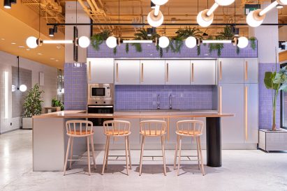 Lavender tiles and a yellow ceiling defines the kitchen area of Resa San Mamés