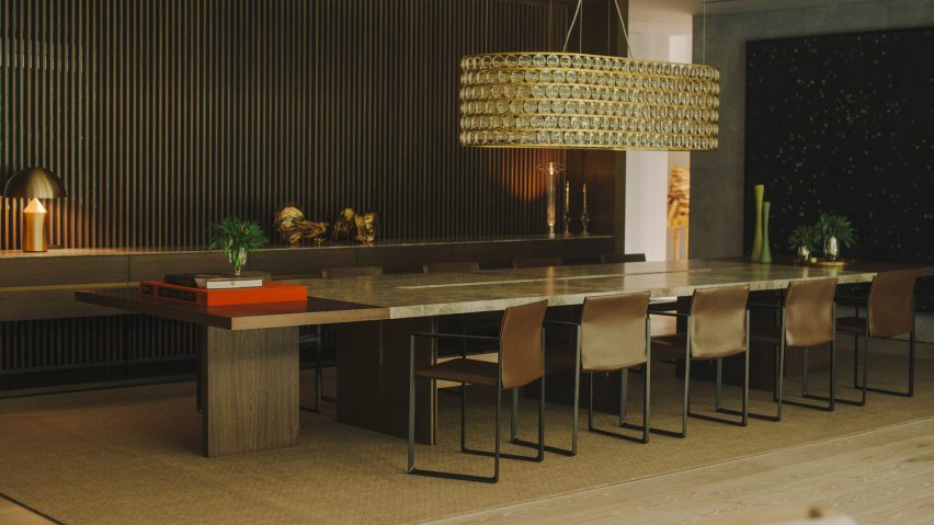 A slatted wall divider in a dining room
