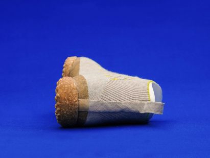 Sneature trainer by Emilie Burfeind on its side