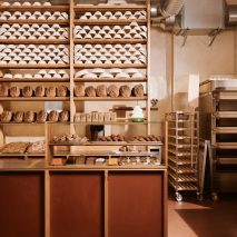 Counter and bread shelf of Sofi bakery in Berlin by Mathias Mentze, Alexander Vedel Ottenstein and Dreimeta