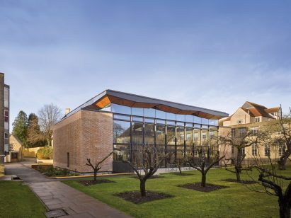 The building is located within an orchard
