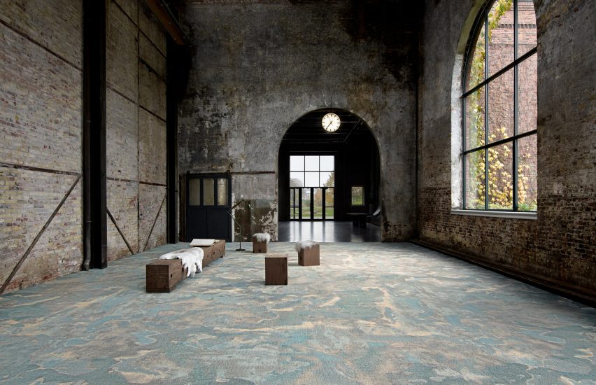 A marble-look carpet in a brick building