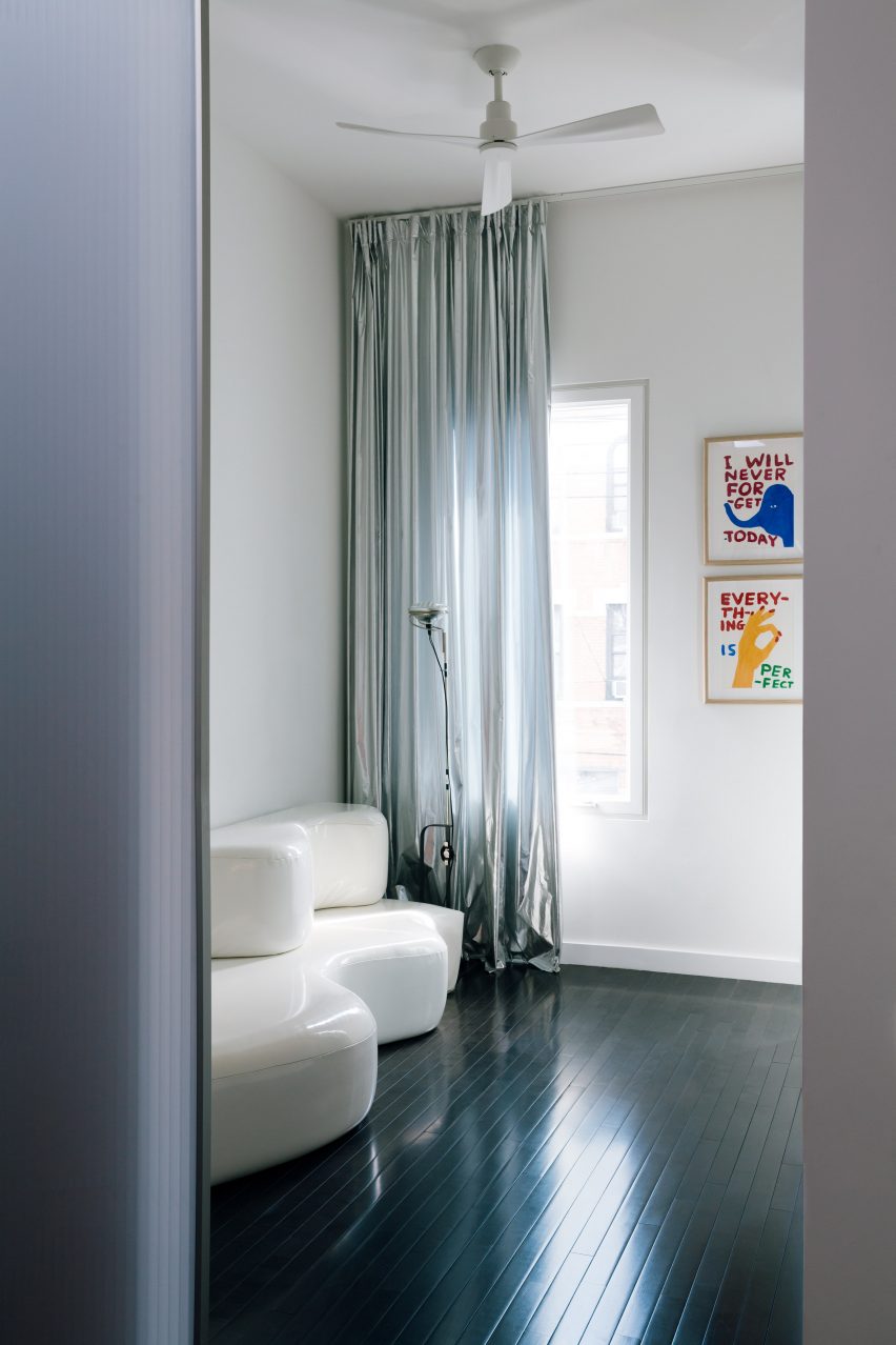 An interior room with hardwood floors