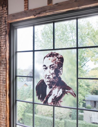 Window decals of church conversion by Skolnick Architecture and Design Partnership