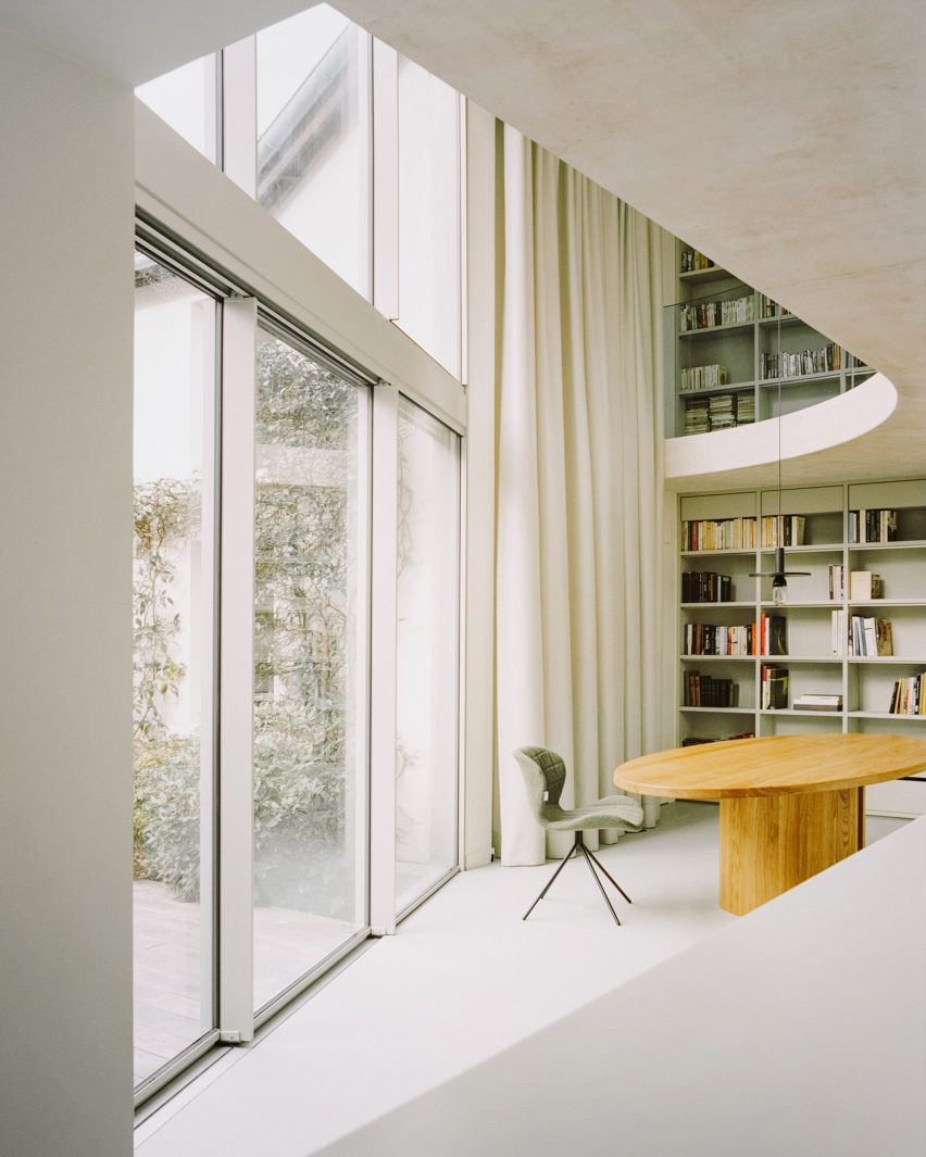 The double-height dining room of a Parisian townhouse