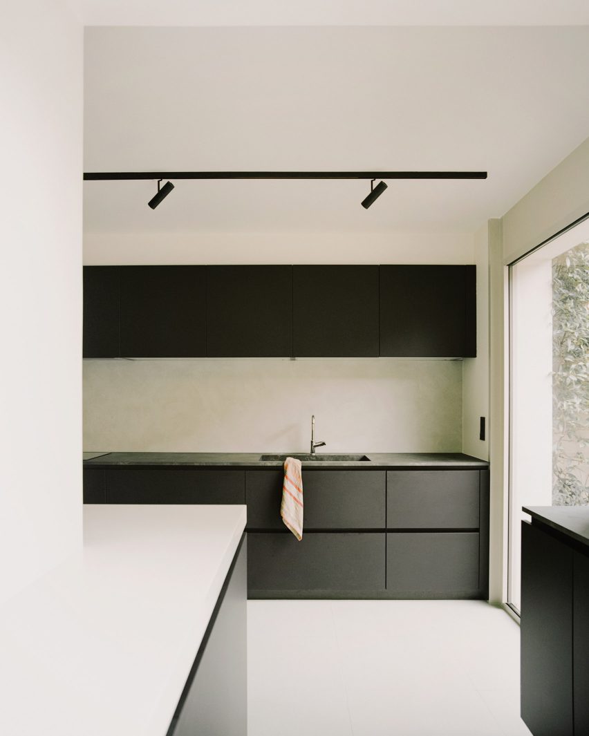 Black cabinetry in a Parisian townhouse by Clément Lesnoff-Rocard