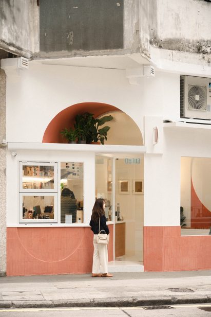 Exterior of cafe with terracotta tiles by Studio Etain Ho and Absence from Island