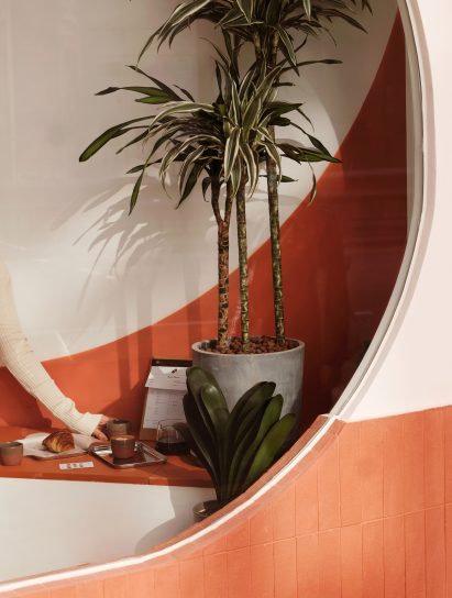 Rounded window and bench seating of Today is Long cafe by Studio Etain Ho and Absence from Island