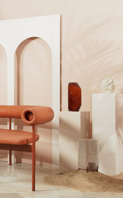 A white set backdrop with vaulted openings