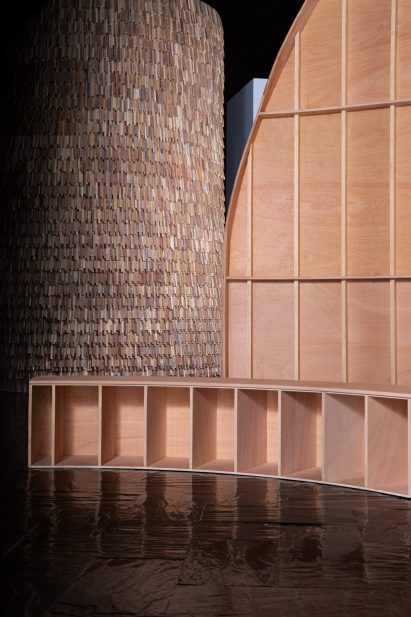 Interior, exterior and seating of a wooden exhibition design by MUT Design