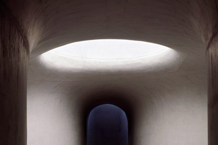 White concrete interiors of Wormhole Library