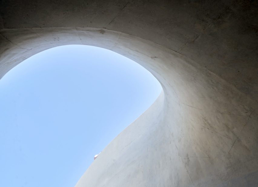 White concrete interiors of Wormhole Library