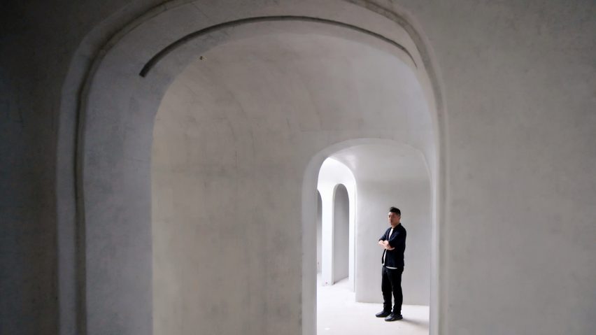 The white concrete interior of Wormhole Library
