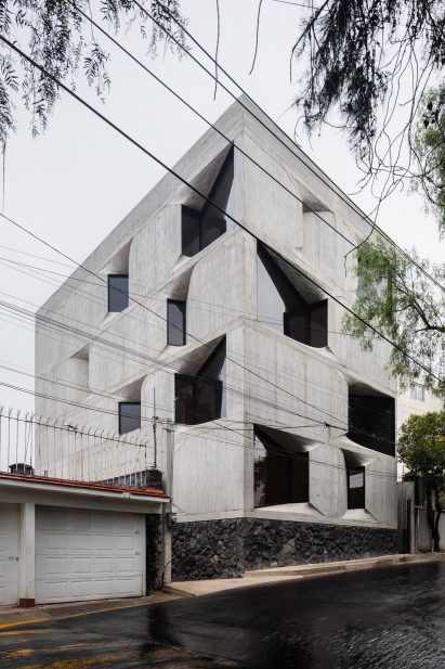 Inverted bay windows on facade of DL1310 housing block