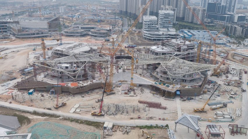 A construction photo of the Zhuhai Jinwan Civic Art Centre by Zaha Hadid Architects
