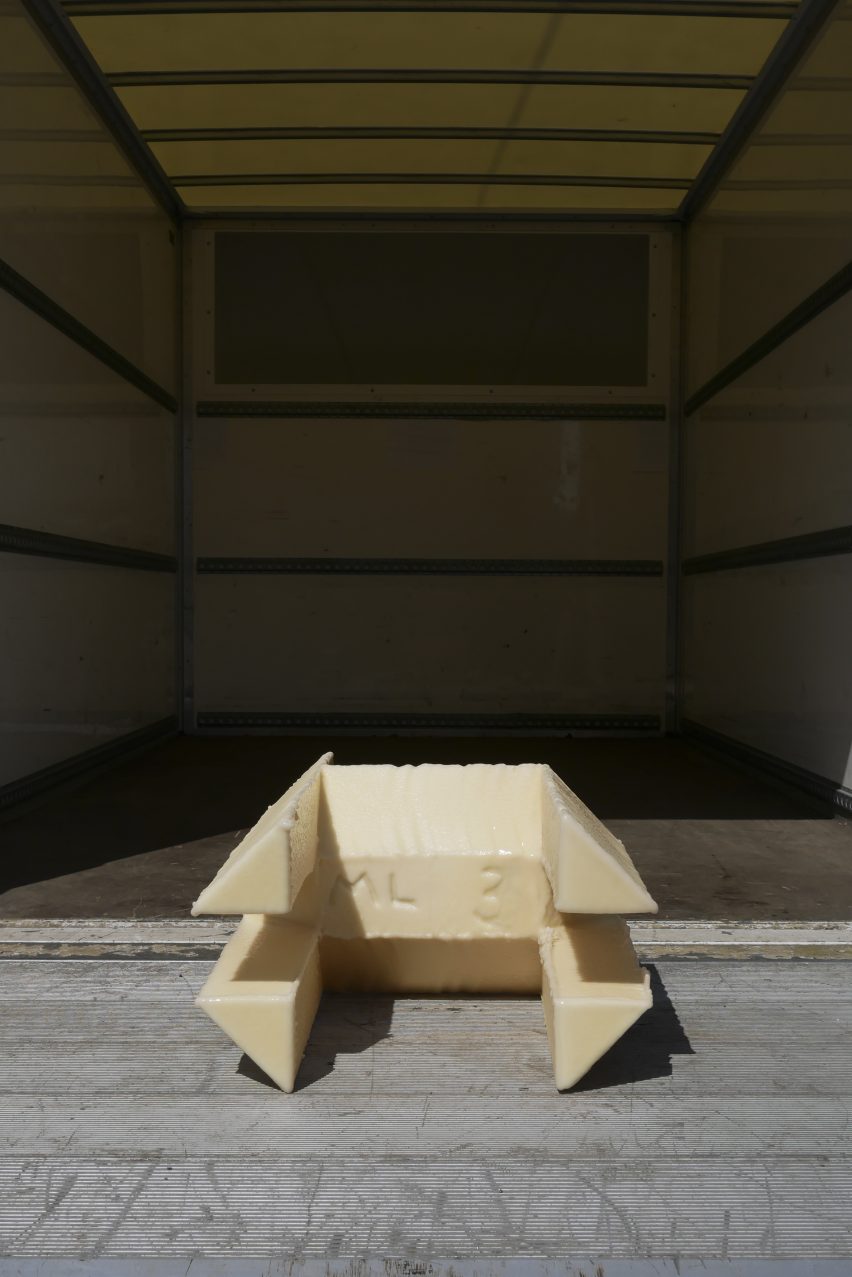 The bottom of one of the polystyrene chairs, numbered by Lamb