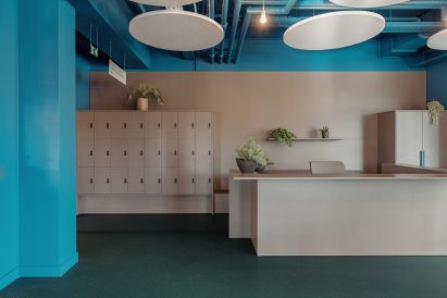 A welcome area is zoned in a muted grey by Studio Anton Hendrik Denys