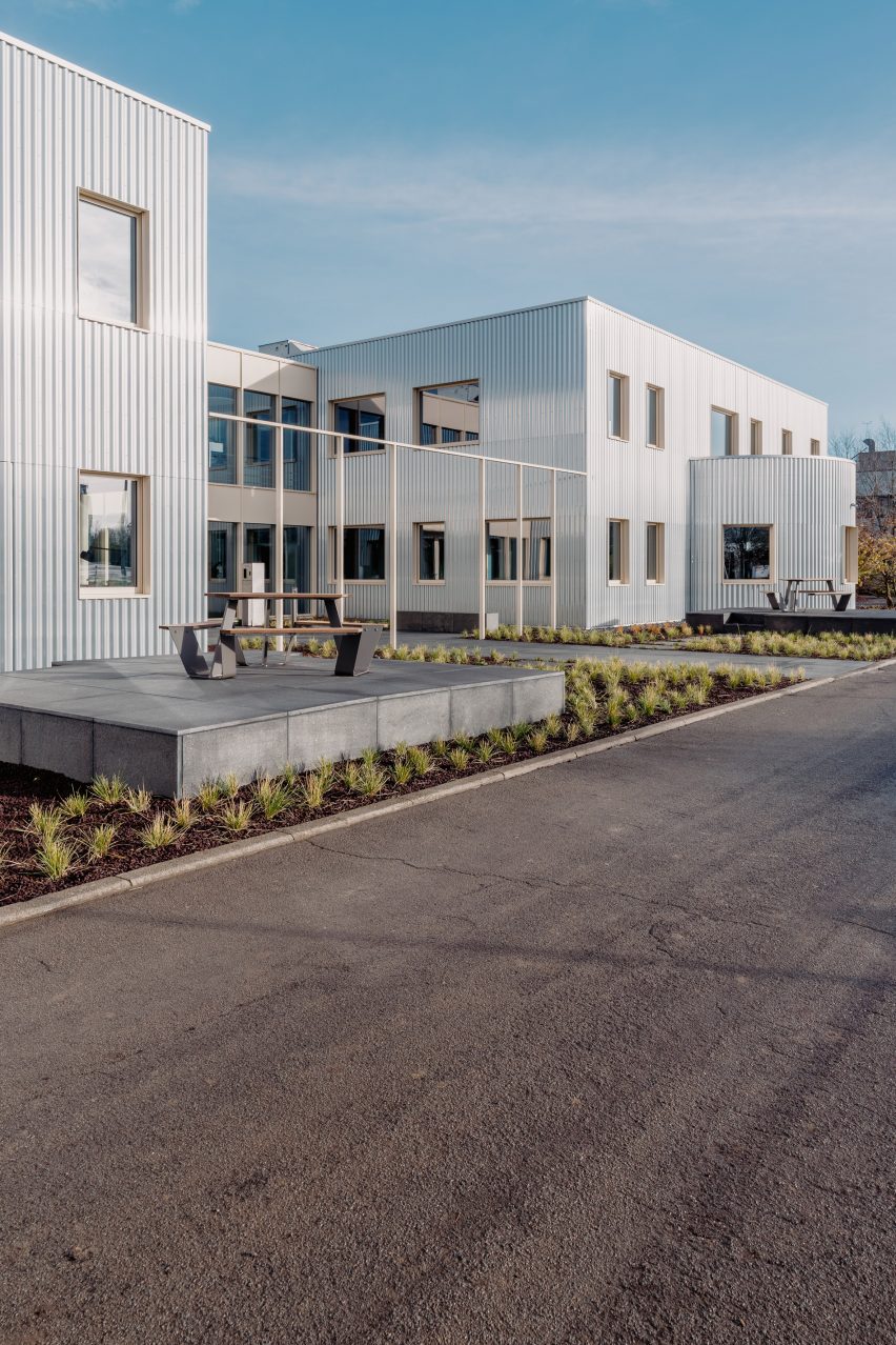 The exterior is clad in corrugated metal