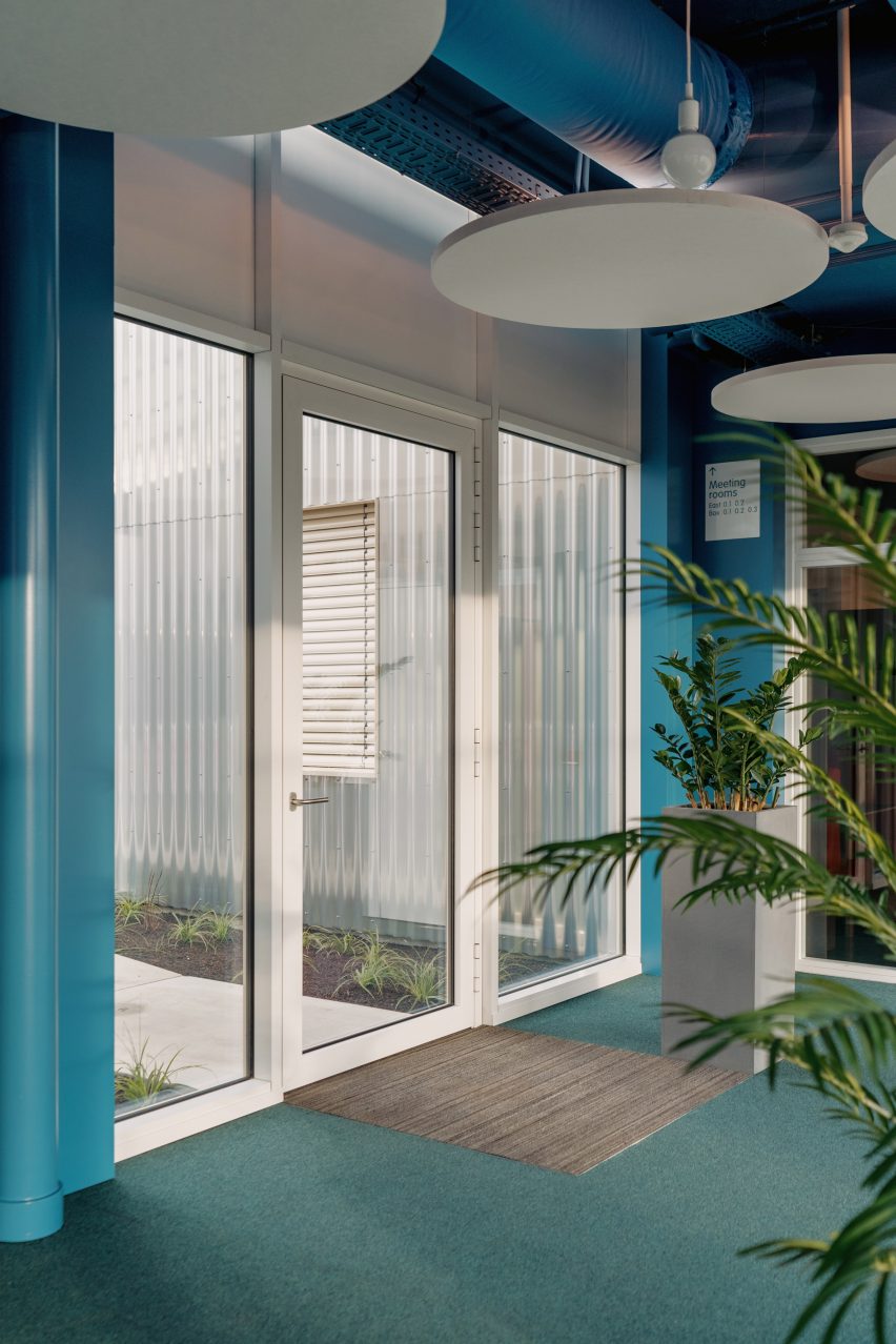 Opal door and window frames contrast with the brightly coloured interior