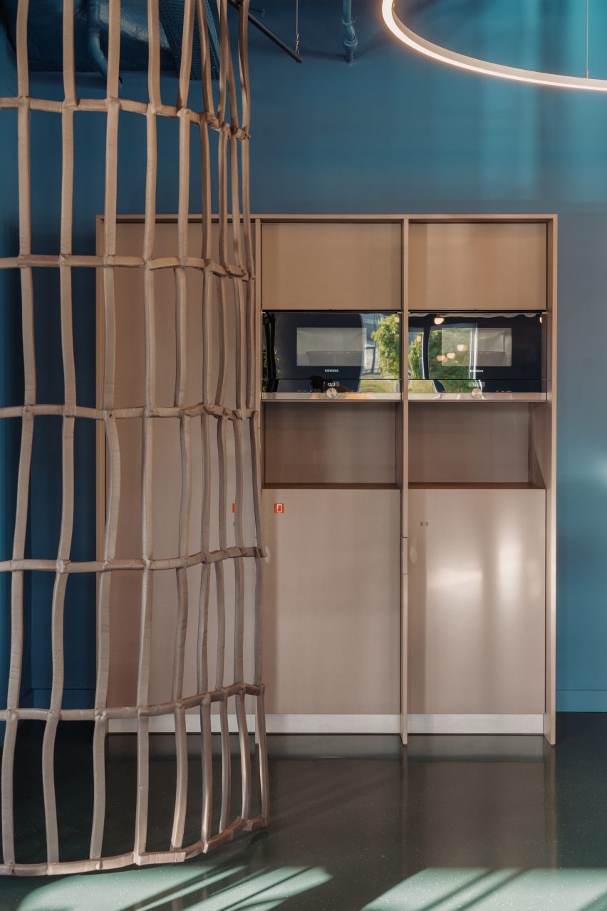 Built in cabinetry contrasts with the walls