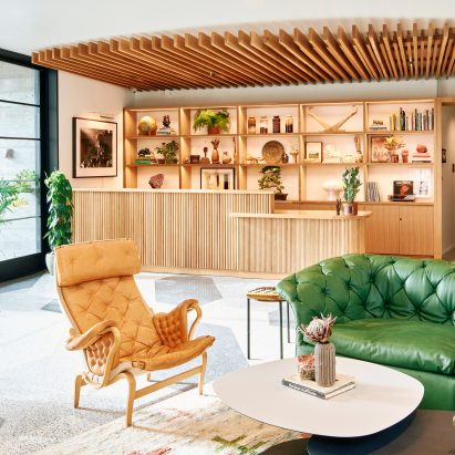 Hotel Magdalena's main lobby with a Moroso green sofa