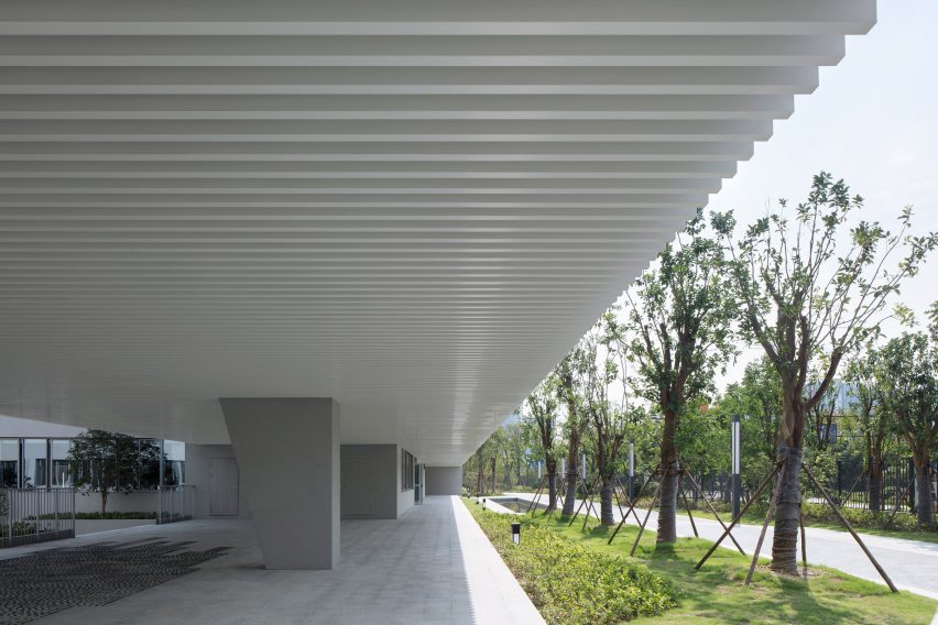 Walkways extend under the structure